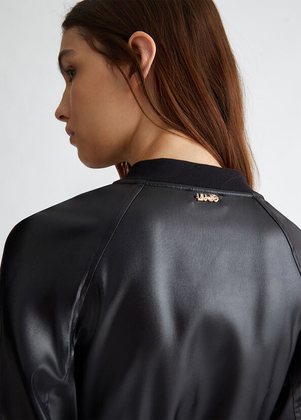 Liu Jo Abito in tessuto spalmato Fino al 60% di sconto